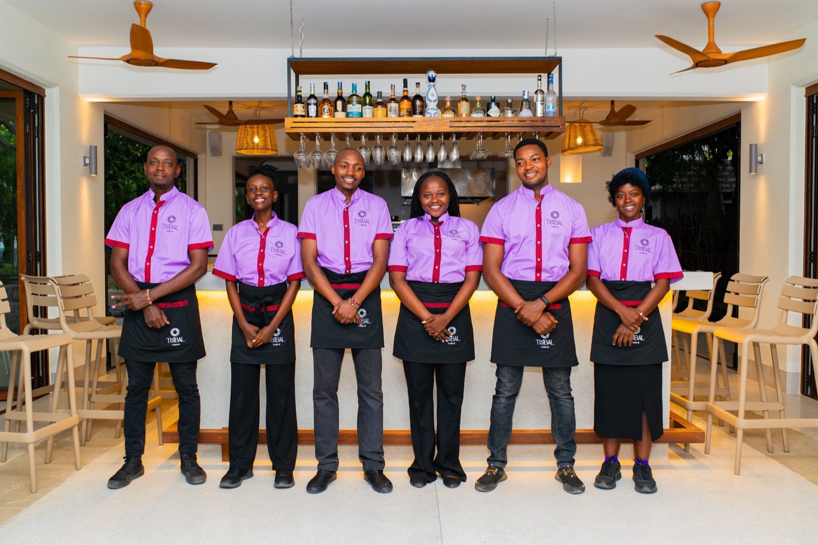 The Tribal Table team at the bar