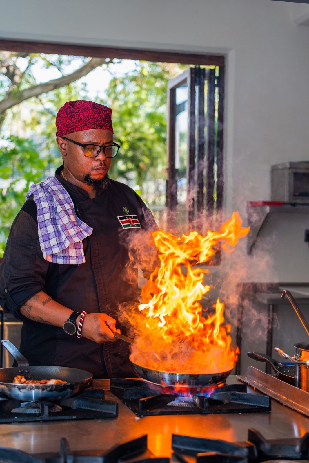 The chef at work in the open kitchen at Tribal Table