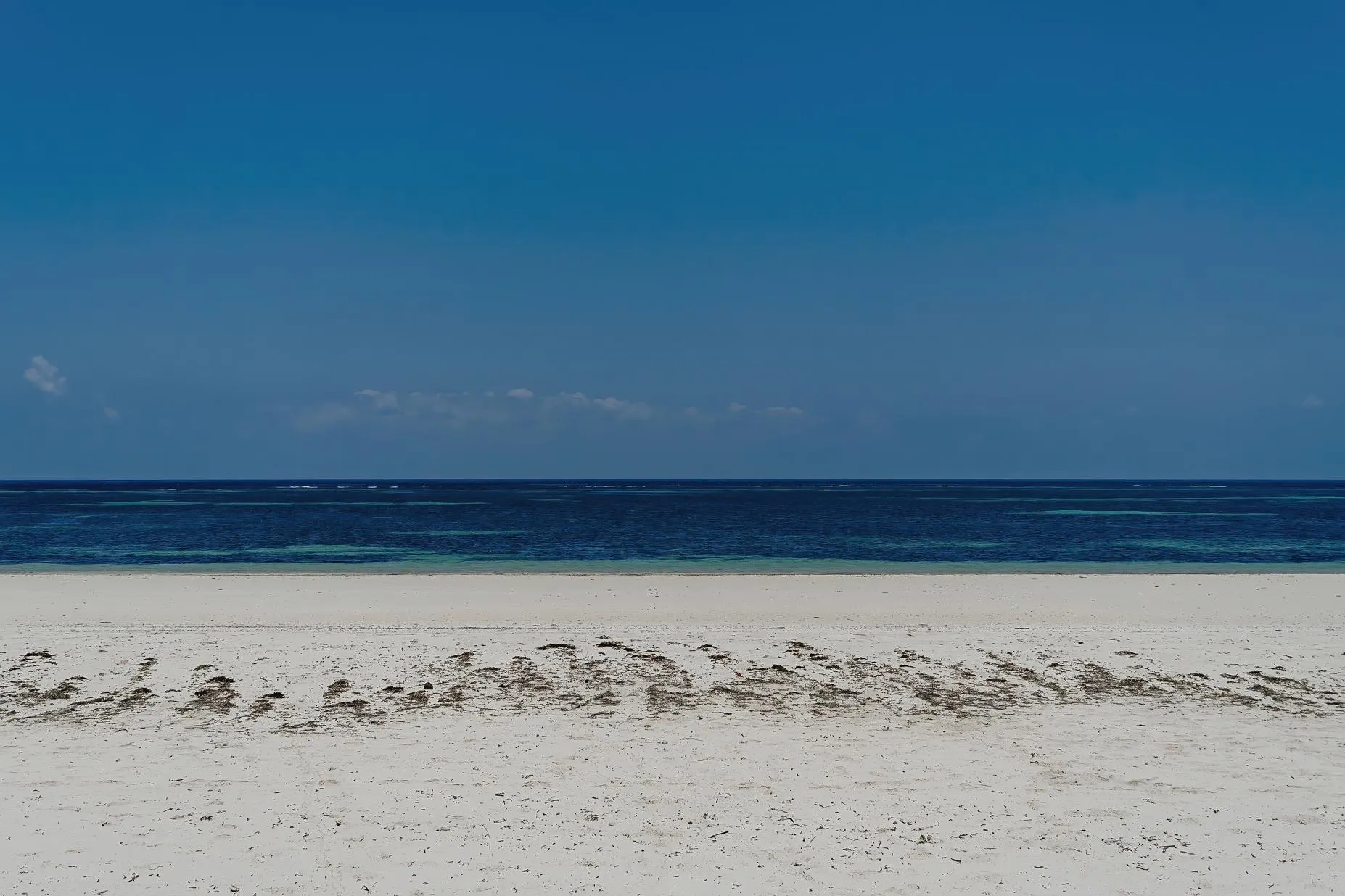 Garoda Beach in front of Zuri, a beachfront hotel in Watamu, with white sand and turquoise water